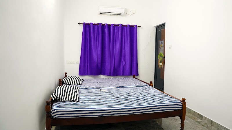 Prakruthi Home Stay room