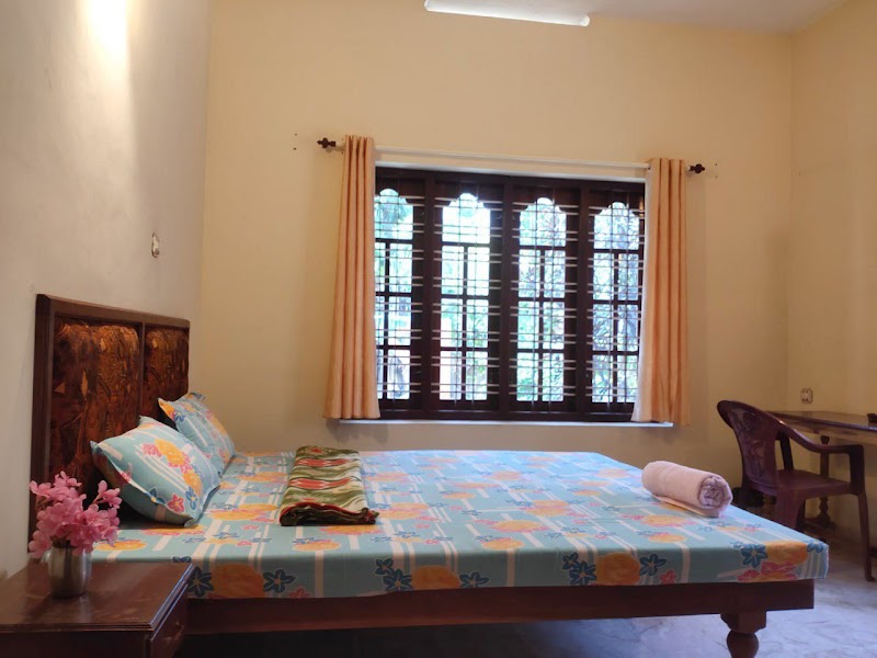 Palazhi by Balakrishna Home Stays room