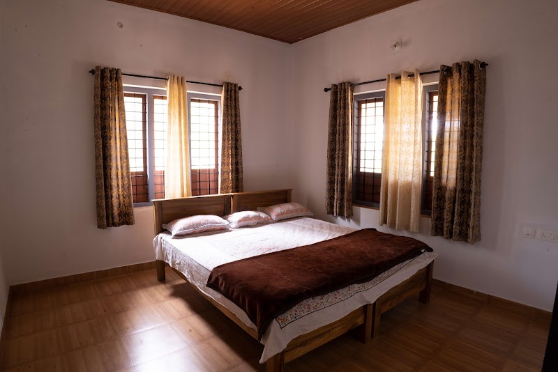 Poovanathil Farms & Homestay room