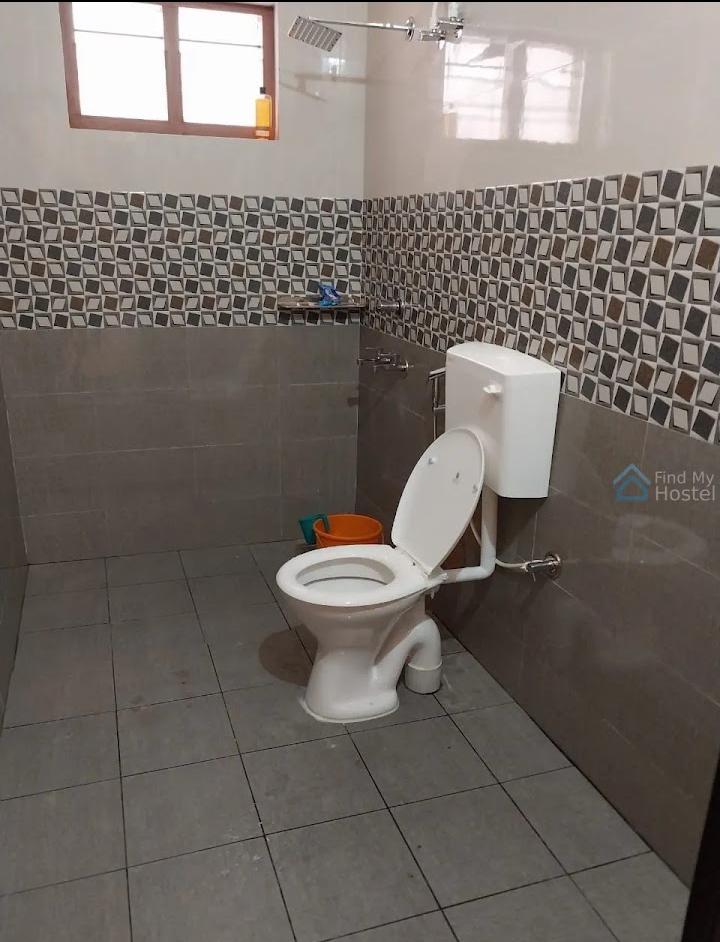Uthradam Ladies Hostel room