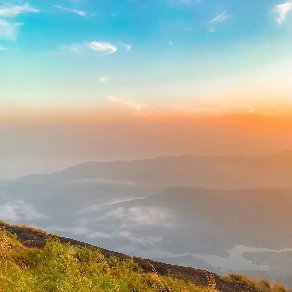 Evening light over the hills — AI-edited photograph; people removed.
